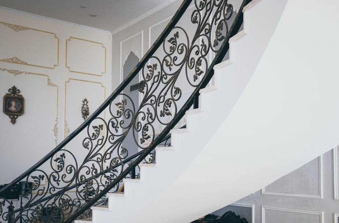 white and brown spiral staircase