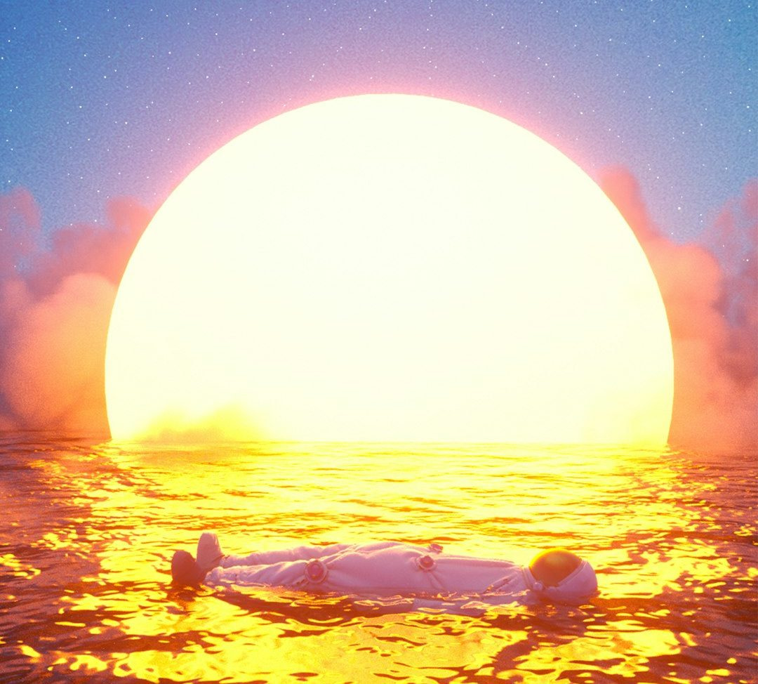 Astronaut floats in a sea under a radiant sun.