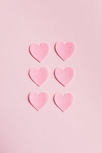 pink heart shaped on pink surface