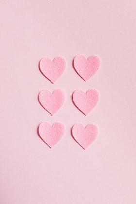 pink heart shaped on pink surface
