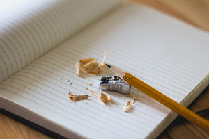 pencil and sharpener on notebook page