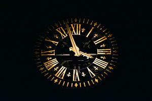 round black and brown analog clock