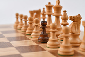 selective focus photography of chess pieces