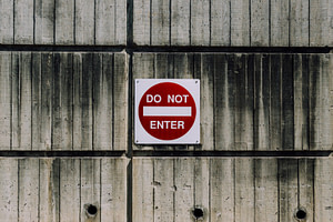 white and red do not enter signage
