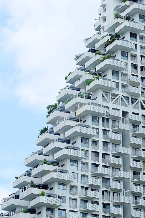 white concrete building under blue sky during daytime