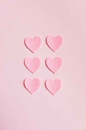 pink heart shaped on pink surface