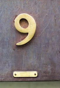 closeup photography of gold number 9