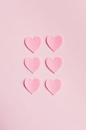 pink heart shaped on pink surface