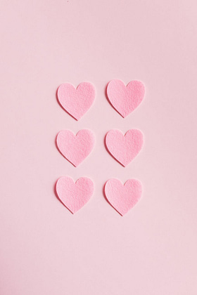 pink heart shaped on pink surface