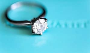 silver-colored ring with clear gemstone photo