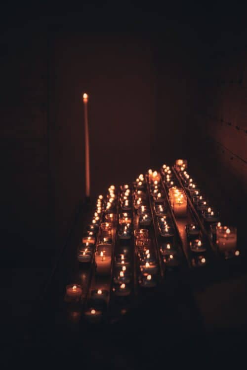 lighted candles on the dark